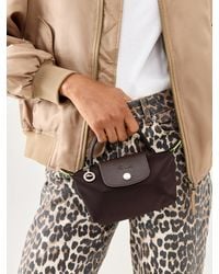 Longchamp - Le Pliage Pouch With Handle Terra Recycled Canvas Bag - Lyst