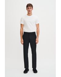 Filippa K - Slim Tapered Wool Trousers - Lyst