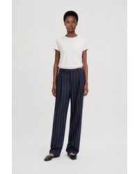Filippa K - Julie Pinstripe Trousers - Lyst