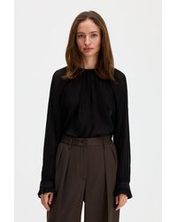 Filippa K - Plissé Raglan Blouse - Lyst