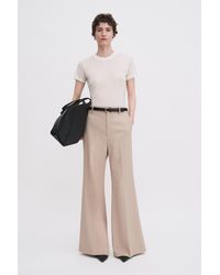 Filippa K - Dionne Flare Trousers - Lyst