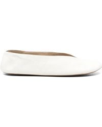 The Row - V-neck Textured Leather Loafers - Lyst