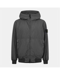 Stone Island - Crinkle Reps Water And Wind Resistant Hooded Long Sleeve Rain Anorak - Lyst