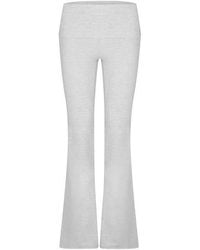 Tala - Dayflex Fold Waist Flared Trousers 30 - Lyst