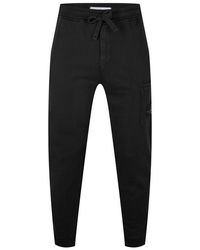 Stone Island - Logo Cotton Lightweight Fleece Joggers - Lyst