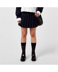 Miu Miu - Pleated Mini Skirt With Metallic Logo - Lyst