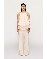 Clea - Bibi Fringe Dipped Hem Top - Lyst