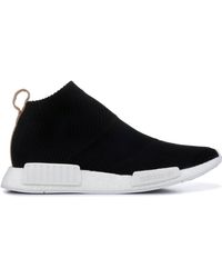 nmd cs1 lux core black