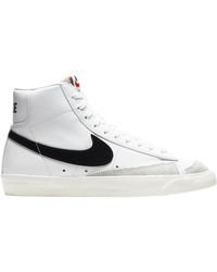 blue and white high top nikes