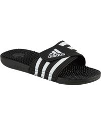 adidas Slippers for Men - Up to 43% off at Lyst.com