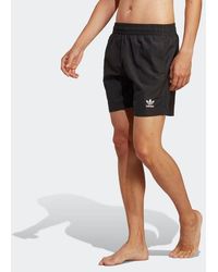 adidas - Originals Essentials Solid Swim Pantalones cortos - Lyst