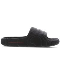 adidas - Adilette Flip-Flops And Sandals - Lyst