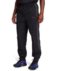 Nike - Tuned Pants - Lyst