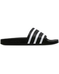 adidas - Adilette Flip-Flops And Sandals - Lyst