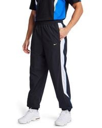 Nike - Tuned Pants - Lyst