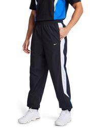 Nike - Tuned Pants - Lyst