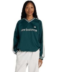 New Balance - Satin Woven Pullover Sweatshirts - Lyst