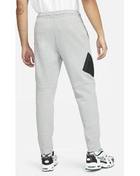 nike tech woven cropped pant