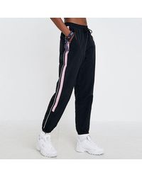 Fila Track pants and sweatpants for Women | Online Sale up to 52% off | Lyst