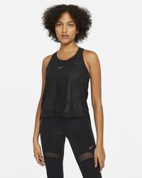 Nike Sleeveless and tank tops for Women | Online Sale up to 80% off | Lyst