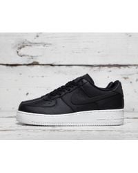 Shop Nike Air Force 1 Flyknit Low Black/Black Team Red Clear Jade