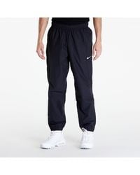 Nike - Pantaloni X Nocta Woven Track Pants - Lyst