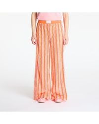 adidas Originals - Pantalons summer glow firebird track pant semi lucid fuchsia/ hazy orange/ semi solar orange xs - Lyst