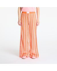 adidas Originals - Pantalons summer glow firebird track pant semi lucid fuchsia/ hazy orange/ semi solar orange m - Lyst