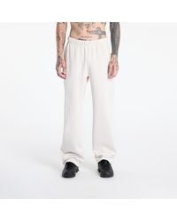 Nike - Broeken X Nocta Fleece Cs Open-Hem Sweatpants Lt Orewood Brn/ Lt Orewood Brn/ Team - Lyst