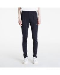 adidas Originals - Pantalon de survêtement adidas adicolor sustainability classic track pant m - Lyst