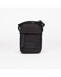 Calvin Klein - Tasche Jeans Metro Nylon Reporter Bag - Lyst