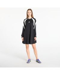 how does the blue black dress work Adidas Ivy Park 1/2 Zip Latex Dress  bei HYPENEEDZ kaufen