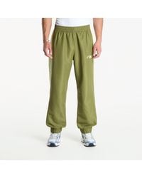 New Balance - Broeken Trackside Woven Pant Sport/ Fennel Seed - Lyst