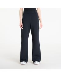 Nike - Pantaloni 24.7 Impossiblysoft Dri-Fit High-Waisted Loose Flared Pants/ Dk Smoke - Lyst