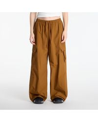 New Balance - Broeken Woven Cargo Pant - Lyst