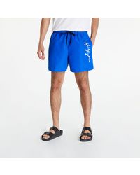 Tommy Hilfiger Logo Medium Drawstring Swim Shorts Blue - Blau