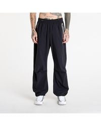 Nike - Hosen Tech Oversized Woven Pants - Lyst