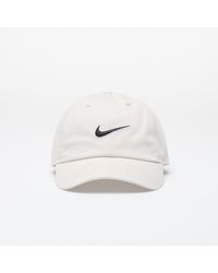 Nike - Club unstructured swoosh cap light bone/ black - Lyst