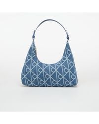 Calvin Klein - Tasche Emblem Aop Denim Sho - Lyst