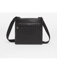 Calvin Klein - Borsa Emblem Aop Emboss Flatpack - Lyst