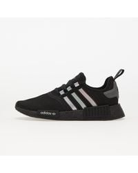 Nmd core 2025 black solar orange