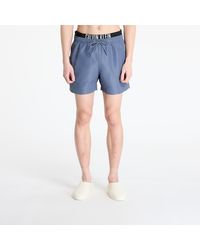Calvin Klein - Maillots de bain jeans medium double wb boardshorts l - Lyst