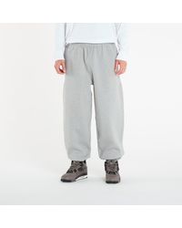 Nike - Jogginghosen Solo Swoosh Cuffed Fleece Pants Dk Heather/ Lt Smoke - Lyst