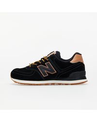 new balance 574 triple black