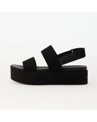 Calvin Klein - Sneakers Jeans Flatform Sandal Slin - Lyst