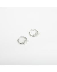 Twojeys - Tj icon earrings universal - Lyst