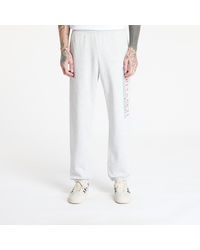 Sporty & Rich - Pantalon de survêtement finish line sweatpant unisex heather gray/ lava/ alpine/ navy xs - Lyst