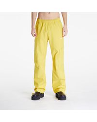 Nike - Pantalons x nocta x l'art de l'automobile tech pants vivid sulfur/ sail xl - Lyst