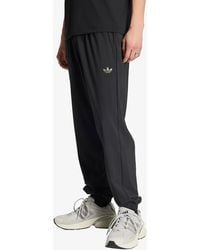 adidas Originals - Broeken Adidas Tech Trefoil Essentials Track Pant - Lyst