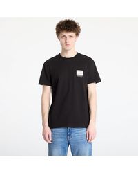 Tommy Hilfiger - T-Shirt Tommy Jeans Regular Dna Graphic Tee - Lyst